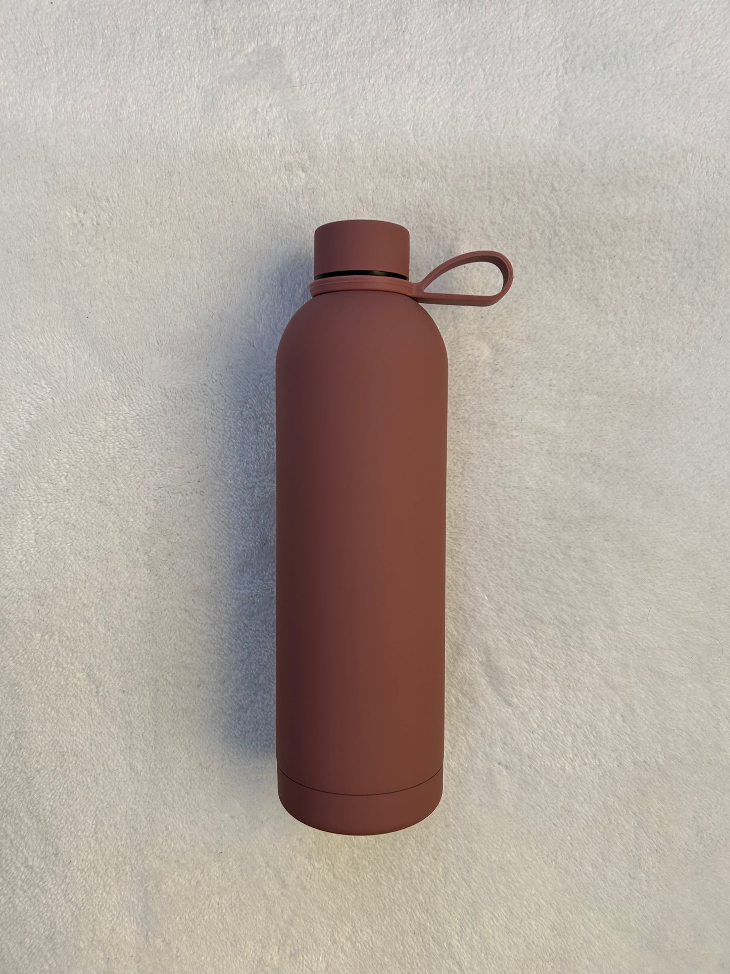 Double walled sports water bottle with strong silicon holder