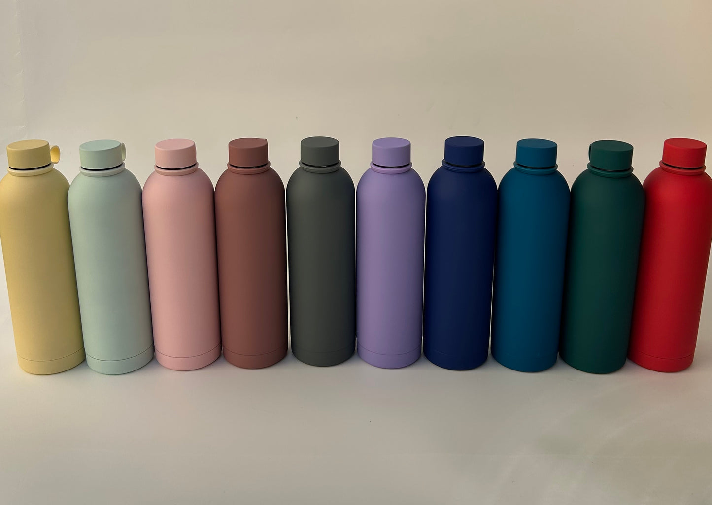 Double walled sports water bottle with strong silicon holder